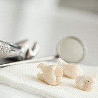 a set of extracted teeth on a napkin